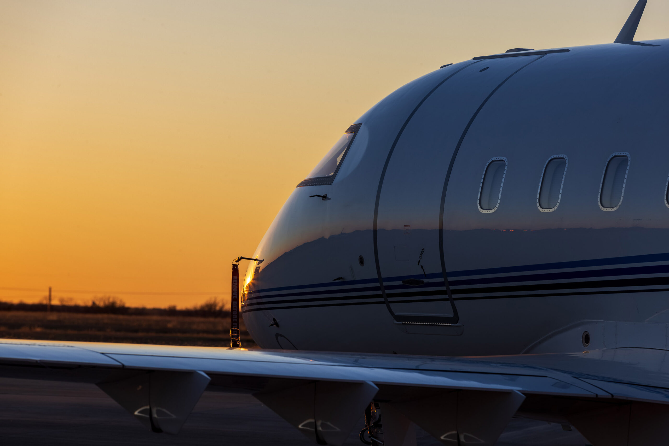Challenger business jet at sunset photographed by Mark Alberts